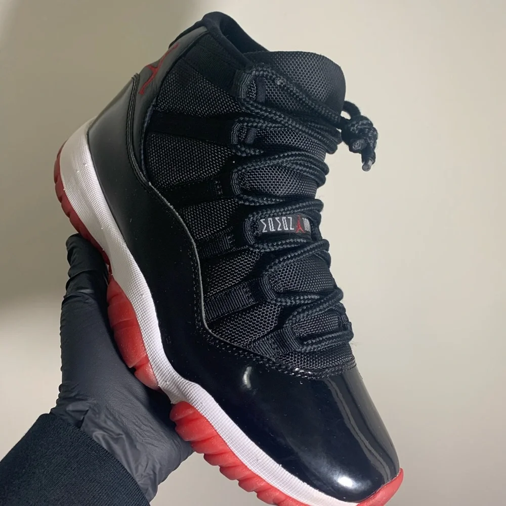 Jordan Men's Black and Red Retro 11 Sneakers